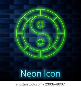 Glowing neon line Yin Yang symbol of harmony and balance icon isolated on brick wall background.  Vector