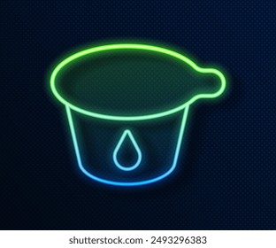 Glowing neon line Yogurt container icon isolated on blue background. Yogurt in plastic cup.  Vector