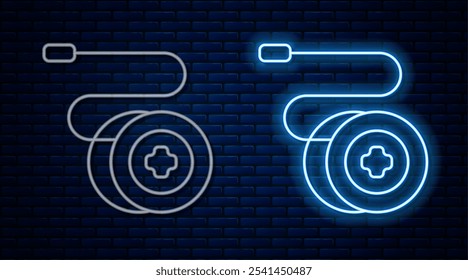 Glowing neon line Yoyo toy icon isolated on brick wall background.  Vector