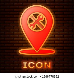 Glowing neon Location with crossed screwdriver and wrench tools icon isolated on brick wall background. Pointer settings symbol.  Vector Illustration