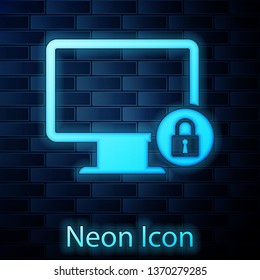 Glowing neon Lock on computer monitor screen icon isolated on brick wall background. Monitor and padlock. Security, safety, protection concept. Safe internetwork. Vector Illustration