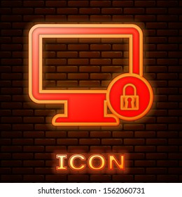 Glowing neon Lock on computer monitor screen icon isolated on brick wall background. Monitor and padlock. Security, safety, protection concept. Safe internetwork.  Vector Illustration