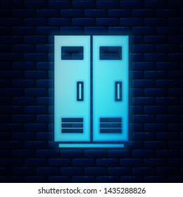 Glowing neon Locker or changing room for football, basketball team or workers icon isolated on brick wall background.  Vector Illustration