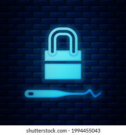 Glowing neon Lockpicks or lock picks for lock picking icon isolated on brick wall background.  Vector