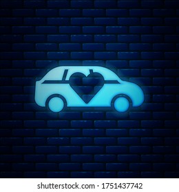 Glowing neon Luxury limousine car icon isolated on brick wall background. For world premiere celebrities and guests poster.  Vector