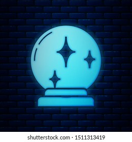 Glowing neon Magic ball icon isolated on brick wall background. Crystal ball.  Vector Illustration