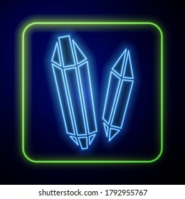 Glowing neon Magic stone icon isolated on blue background. Fantasy crystal. Jewelry gem for game.  Vector Illustration