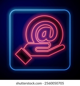 Glowing neon Mail and e-mail in hand icon isolated on blue background. Envelope symbol e-mail. Email message sign.  Vector Illustration