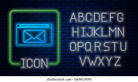 Glowing neon Mail and e-mail icon isolated on brick wall background. Envelope symbol e-mail. Email message sign. Neon light alphabet. Vector Illustration