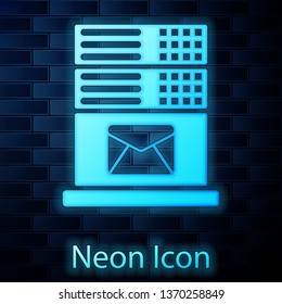 Glowing neon Mail server icon isolated on brick wall background. Vector Illustration