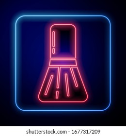 Glowing neon Makeup brush icon isolated on blue background.  Vector Illustration