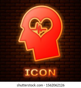 Glowing neon Male head with a heartbeat icon isolated on brick wall background. Head with mental health, healthcare and medical sign.  Vector Illustration