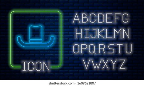 Glowing neon Man hat with ribbon icon isolated on brick wall background. Neon light alphabet. Vector Illustration