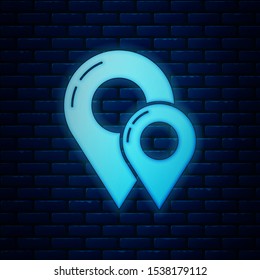 Glowing neon Map pin icon isolated on brick wall background. Navigation, pointer, location, map, gps, direction, place, compass, contact, search concept.  Vector Illustration