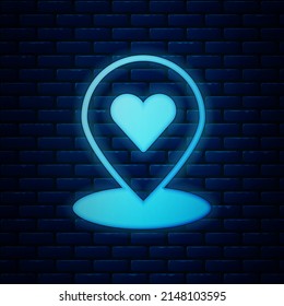 Glowing neon Map pointer with heart icon isolated on brick wall background. Valentines day. Love location. Romantic map pin.  Vector