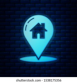 Glowing neon Map pointer with house icon isolated on brick wall background. Home location marker symbol.  Vector Illustration