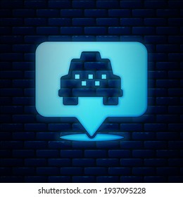 Glowing neon Map pointer with taxi icon isolated on brick wall background. Location symbol.  Vector