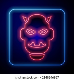 Glowing neon Mask of the devil with horns icon isolated on black background.  Vector