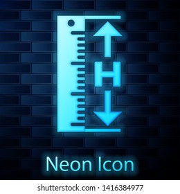 Glowing neon The measuring height and length icon isolated on brick wall background. Ruler, straightedge, scale symbol.  Vector Illustration