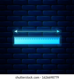 Glowing neon The measuring height and length icon isolated on brick wall background. Ruler, straightedge, scale symbol.  Vector Illustration