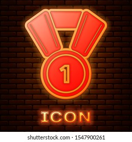 Glowing neon Medal icon isolated on brick wall background. Winner symbol.  Vector Illustration