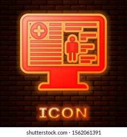 Glowing neon Medical clinical record on monitor icon isolated on brick wall background. Health insurance form. Prescription, medical check marks report.  Vector Illustration