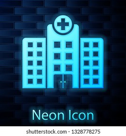 Glowing neon Medical hospital building with cross icon isolated on brick wall background. Medical center. Health care. Vector Illustration