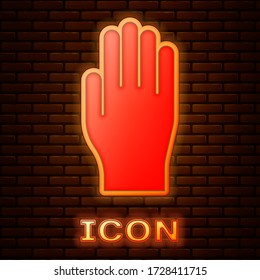 Glowing neon Medical rubber gloves icon isolated on brick wall background. Protective rubber gloves. Vector Illustration