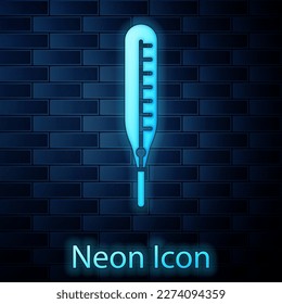 Glowing neon Medical thermometer for medical examination icon isolated on brick wall background.  Vector Illustration