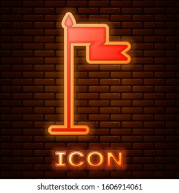 Glowing neon Medieval flag icon isolated on brick wall background. Country, state, or territory ruled by a king or queen.  Vector Illustration
