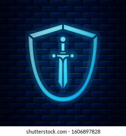 Glowing neon Medieval shield with sword icon isolated on brick wall background.  Vector Illustration