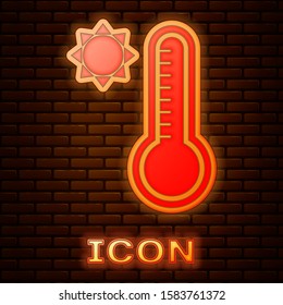 Glowing neon Meteorology thermometer measuring heat and cold icon isolated on brick wall background. Thermometer equipment showing hot or cold weather.  Vector Illustration