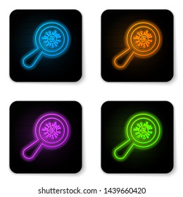 Glowing neon Microorganisms under magnifier icon isolated on white background. Bacteria and germs, cell cancer, microbe, virus, fungi. Black square button. Vector Illustration