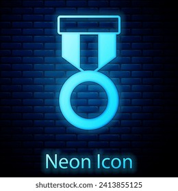 Glowing neon Military reward medal icon isolated on brick wall background. Army sign.  Vector