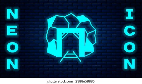 Glowing neon Mine entrance icon isolated on brick wall background.  Vector