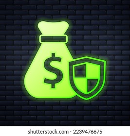 Glowing neon Money bag with shield icon isolated on brick wall background. Insurance concept. Security, safety, protection, protect concept.  Vector