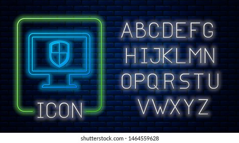Glowing neon Monitor and shield icon isolated on brick wall background. Computer security, firewall technology, internet privacy safety or antivirus. Neon light alphabet. Vector Illustration