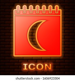 Glowing neon Moon phases calendar icon isolated on brick wall background.  Vector Illustration