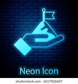 Glowing neon Mountains with flag on top icon isolated on brick wall background. Symbol of victory or success concept. Goal achievement.  Vector