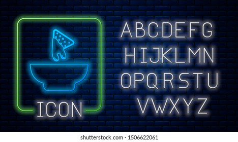 Glowing neon Nachos in plate icon isolated on brick wall background. Tortilla chips or nachos tortillas. Traditional mexican fast food. Neon light alphabet. Vector Illustration