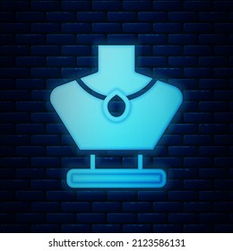 Glowing neon Necklace on mannequin icon isolated on brick wall background.  Vector