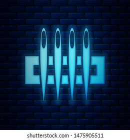 Glowing neon Needle for sewing icon isolated on brick wall background. Tailor symbol. Textile sew up craft sign. Embroidery tool.  Vector Illustration