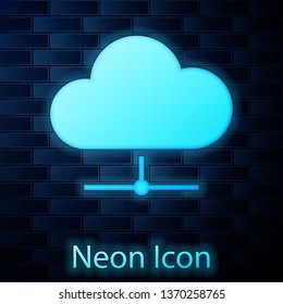 Glowing neon Network cloud connection icon isolated on brick wall background. Social technology. Cloud computing concept. Vector Illustration