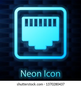 Glowing neon Network port - cable socket icon isolated on brick wall background. LAN, ethernet port sign. Local area connector icon. Vector Illustration