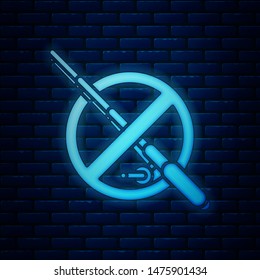 Glowing neon No fishing icon isolated on brick wall background. Prohibition sign.  Vector Illustration