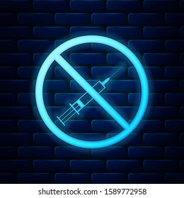 Glowing neon No vaccine icon isolated on brick wall background. No syringe sign. Vaccination, injection, vaccine, insulin concept.  Vector Illustration