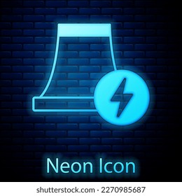Glowing neon Nuclear power plant icon isolated on brick wall background. Energy industrial concept.  Vector