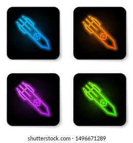 Glowing neon Nuclear rocket icon isolated on white background. Rocket bomb flies down. Black square button. Vector Illustration
