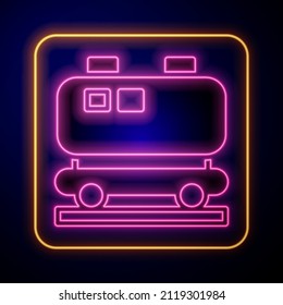 Glowing neon Oil railway cistern icon isolated on black background. Train oil tank on railway car. Rail freight. Oil industry.  Vector