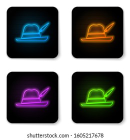 Glowing neon Oktoberfest hat icon isolated on white background. Hunter hat with feather. German hat. Black square button. Vector Illustration